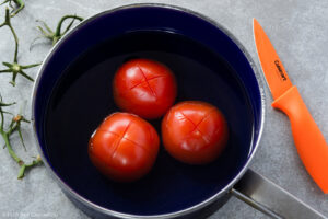 Vine tomatoes scored