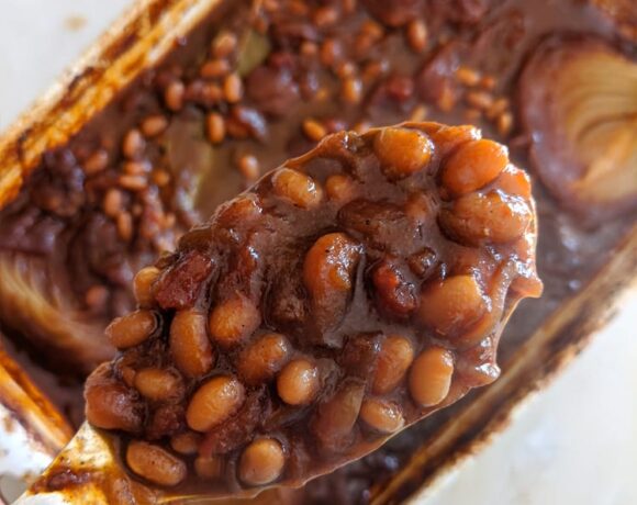 a spoon full of vegan baked beans