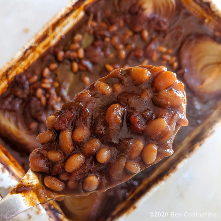 a spoon full of baked beans