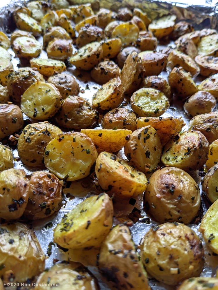 herb roasted potatoes in a sheet pan