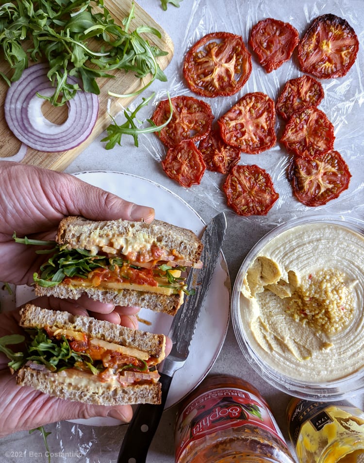oven-dried tomato slices in a sandwich